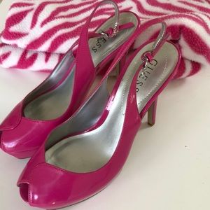 Guess hot pink patent platform heels.